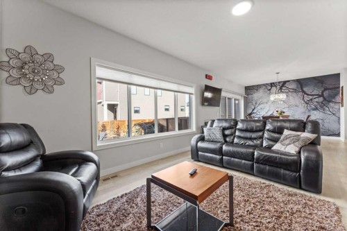 804 Shawnee Terrace Sw, Calgary, AB - Indoor Photo Showing Living Room