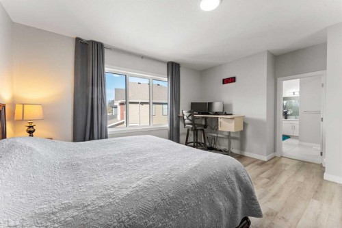 804 Shawnee Terrace Sw, Calgary, AB - Indoor Photo Showing Bedroom