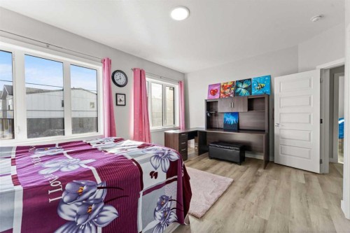 804 Shawnee Terrace Sw, Calgary, AB - Indoor Photo Showing Bedroom