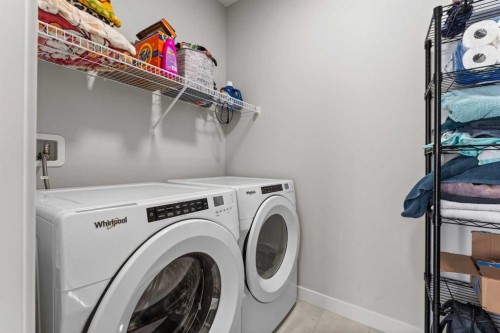 804 Shawnee Terrace Sw, Calgary, AB - Indoor Photo Showing Laundry Room