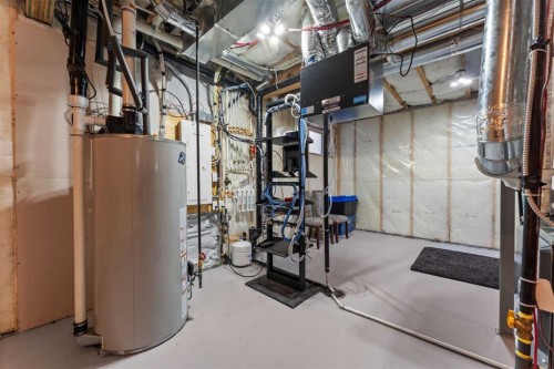 804 Shawnee Terrace Sw, Calgary, AB - Indoor Photo Showing Basement