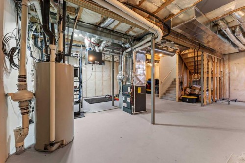 804 Shawnee Terrace Sw, Calgary, AB - Indoor Photo Showing Basement