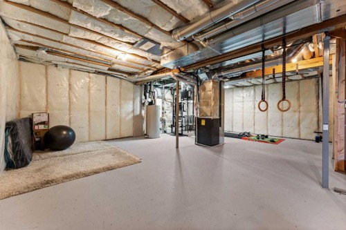 804 Shawnee Terrace Sw, Calgary, AB - Indoor Photo Showing Basement