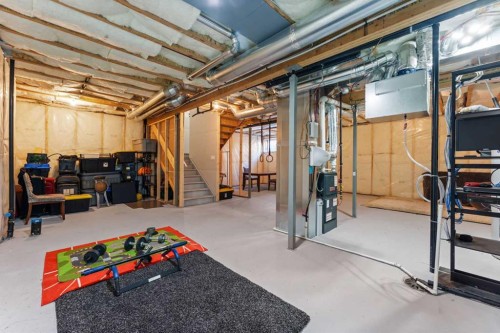 804 Shawnee Terrace Sw, Calgary, AB - Indoor Photo Showing Basement