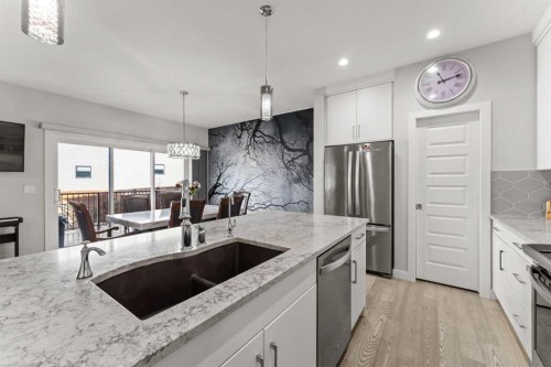 804 Shawnee Terrace Sw, Calgary, AB - Indoor Photo Showing Kitchen With Double Sink With Upgraded Kitchen