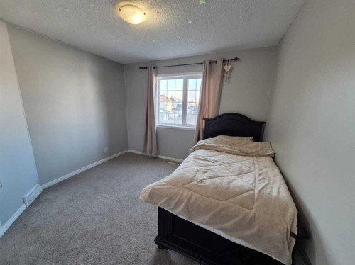 422 Bridlecreek Green Sw, Calgary, AB - Indoor Photo Showing Bedroom