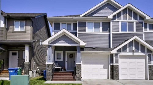 135 Reunion Loop Nw, Airdrie, AB - Outdoor With Facade