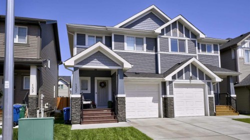 135 Reunion Loop Nw, Airdrie, AB - Outdoor With Facade