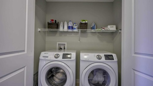 135 Reunion Loop Nw, Airdrie, AB - Indoor Photo Showing Laundry Room