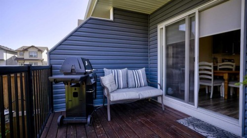 135 Reunion Loop Nw, Airdrie, AB - Outdoor With Deck Patio Veranda With Exterior