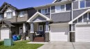 135 Reunion Loop Nw, Airdrie, AB  - Outdoor With Facade 