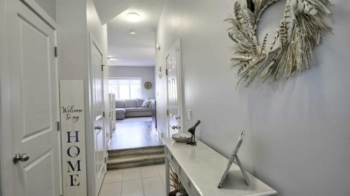 135 Reunion Loop Nw, Airdrie, AB - Indoor Photo Showing Other Room