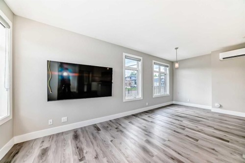 115-1702 17 Avenue Sw, Calgary, AB - Indoor Photo Showing Living Room