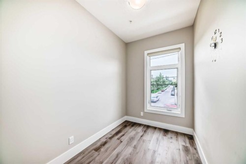 115-1702 17 Avenue Sw, Calgary, AB - Indoor Photo Showing Other Room