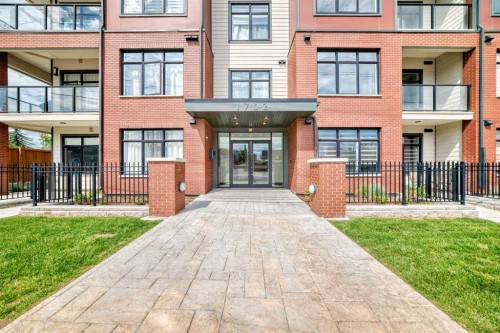 115-1702 17 Avenue Sw, Calgary, AB - Outdoor With Balcony With Facade