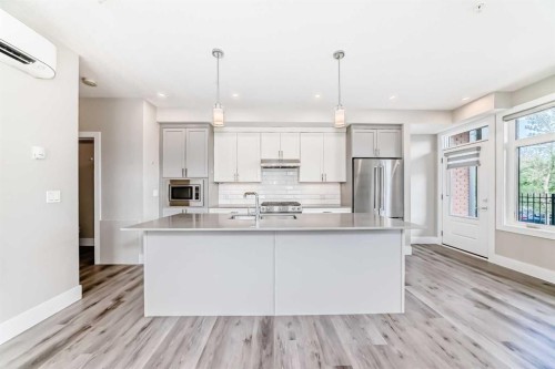 115-1702 17 Avenue Sw, Calgary, AB - Indoor Photo Showing Kitchen