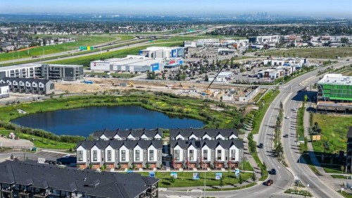 107-474 Seton Circle Se, Calgary, AB - Outdoor With Body Of Water With View