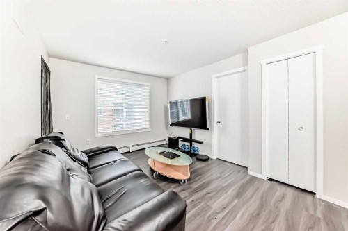 4513-4641 128 Avenue Ne, Calgary, AB - Indoor Photo Showing Living Room