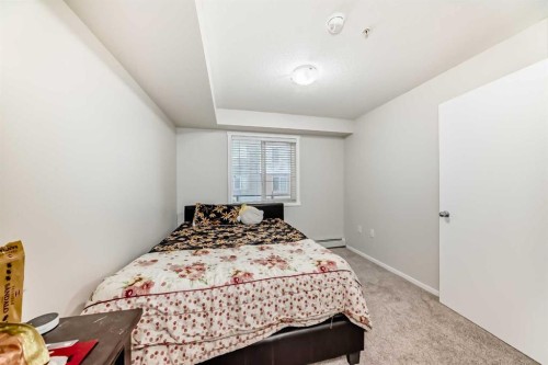 4513-4641 128 Avenue Ne, Calgary, AB - Indoor Photo Showing Bedroom