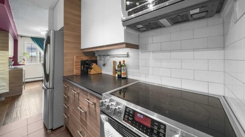 105-1320 12 Avenue Sw, Calgary, AB - Indoor Photo Showing Kitchen With Upgraded Kitchen