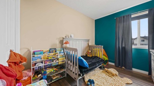 221 Elgin Place Se, Calgary, AB - Indoor Photo Showing Bedroom