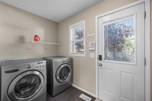 89 Mckenzie Towne Drive Se, Calgary, AB - Indoor Photo Showing Laundry Room