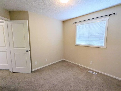 187 Evansborough Way Nw, Calgary, AB - Indoor Photo Showing Other Room