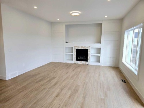 1350 Scarlett Ranch Boulevard, Carstairs, AB - Indoor With Fireplace
