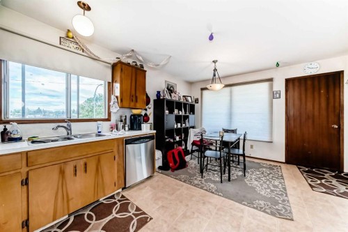 6203 Rundlehorn Drive Ne, Calgary, AB - Indoor Photo Showing Kitchen With Double Sink