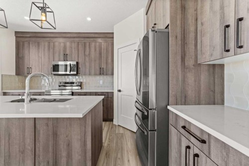 71 Vincent Crescent, Olds, AB - Indoor Photo Showing Kitchen With Upgraded Kitchen