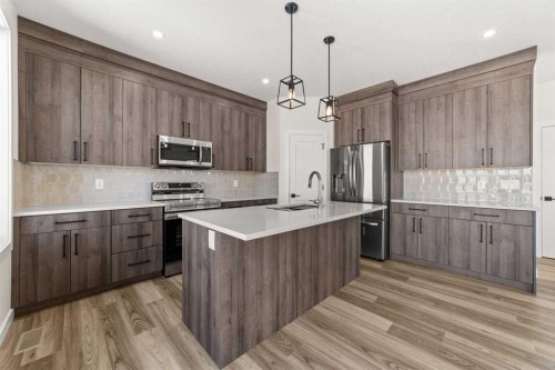 71 Vincent Crescent, Olds, AB - Indoor Photo Showing Kitchen With Upgraded Kitchen