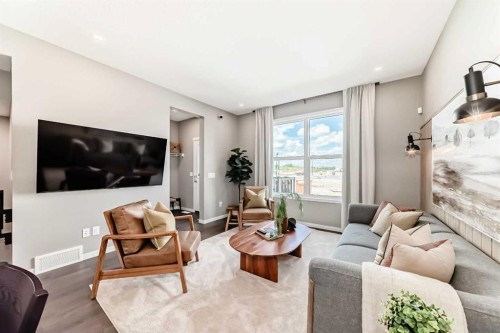 1014 Sawgrass Link Nw, Airdrie, AB - Indoor Photo Showing Living Room