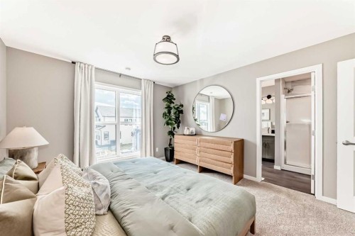 1014 Sawgrass Link Nw, Airdrie, AB - Indoor Photo Showing Bedroom