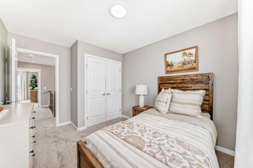 1014 Sawgrass Link Nw, Airdrie, AB - Indoor Photo Showing Bedroom