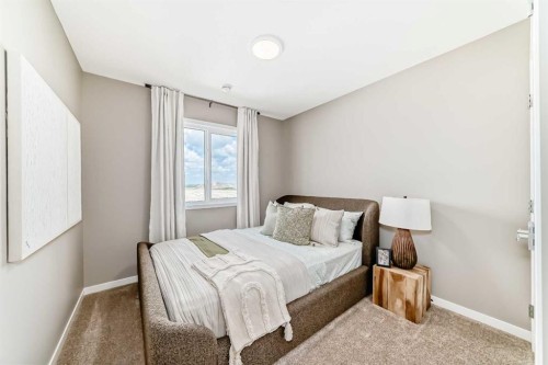 1014 Sawgrass Link Nw, Airdrie, AB - Indoor Photo Showing Bedroom