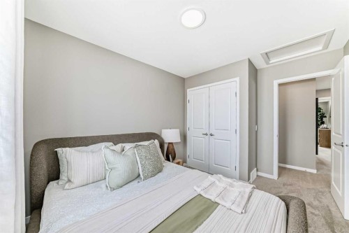 1014 Sawgrass Link Nw, Airdrie, AB - Indoor Photo Showing Bedroom