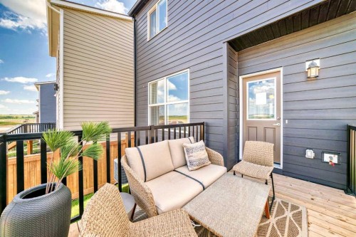 1014 Sawgrass Link Nw, Airdrie, AB - Outdoor With Deck Patio Veranda With Exterior