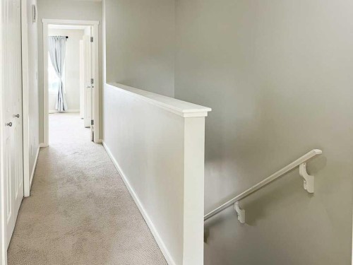 28 Kinlea Common Nw, Calgary, AB - Indoor Photo Showing Other Room