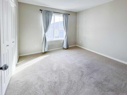 28 Kinlea Common Nw, Calgary, AB - Indoor Photo Showing Other Room