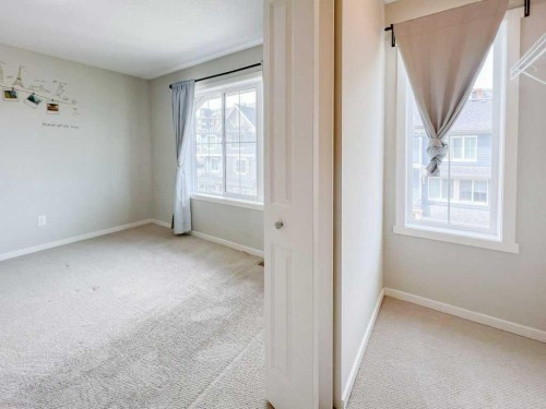 28 Kinlea Common Nw, Calgary, AB - Indoor Photo Showing Other Room