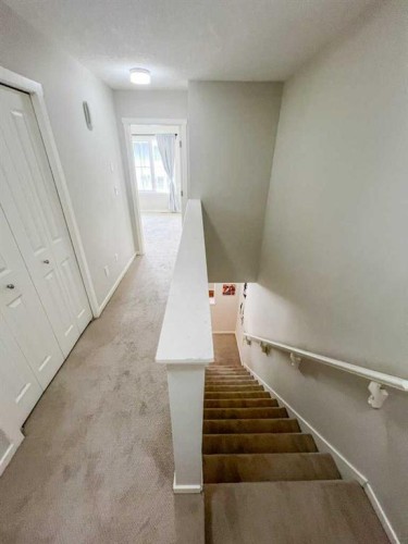 28 Kinlea Common Nw, Calgary, AB - Indoor Photo Showing Other Room