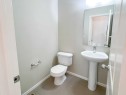 28 Kinlea Common Nw, Calgary, AB  - Indoor Photo Showing Bathroom 