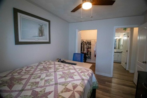 103-604 19 Street Se, High River, AB - Indoor Photo Showing Bedroom