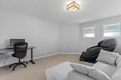 13 Sage Hill Landing Nw, Calgary, AB - Indoor Photo Showing Other Room