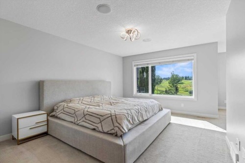 13 Sage Hill Landing Nw, Calgary, AB - Indoor Photo Showing Bedroom