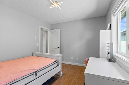 13 Sage Hill Landing Nw, Calgary, AB - Indoor Photo Showing Bedroom