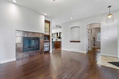 13 Sage Hill Landing Nw, Calgary, AB - Indoor Photo Showing Living Room With Fireplace