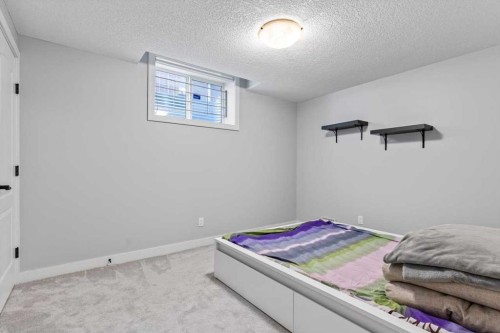 13 Sage Hill Landing Nw, Calgary, AB - Indoor Photo Showing Bedroom
