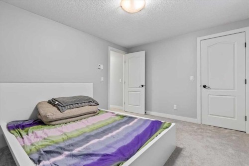13 Sage Hill Landing Nw, Calgary, AB - Indoor Photo Showing Bedroom