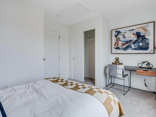 105-2231 81 Street Sw, Calgary, AB - Indoor Photo Showing Bedroom